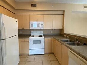 1220 Reserve Way-Unit -205 in Naples, FL - Building Photo - Building Photo