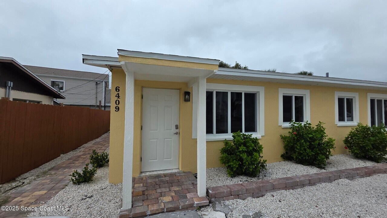 6409 Ridgewood Ave in Cocoa Beach, FL - Building Photo