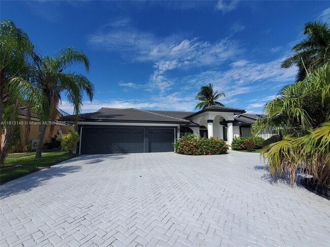 9733 NW 52nd Pl in Coral Springs, FL - Building Photo - Building Photo