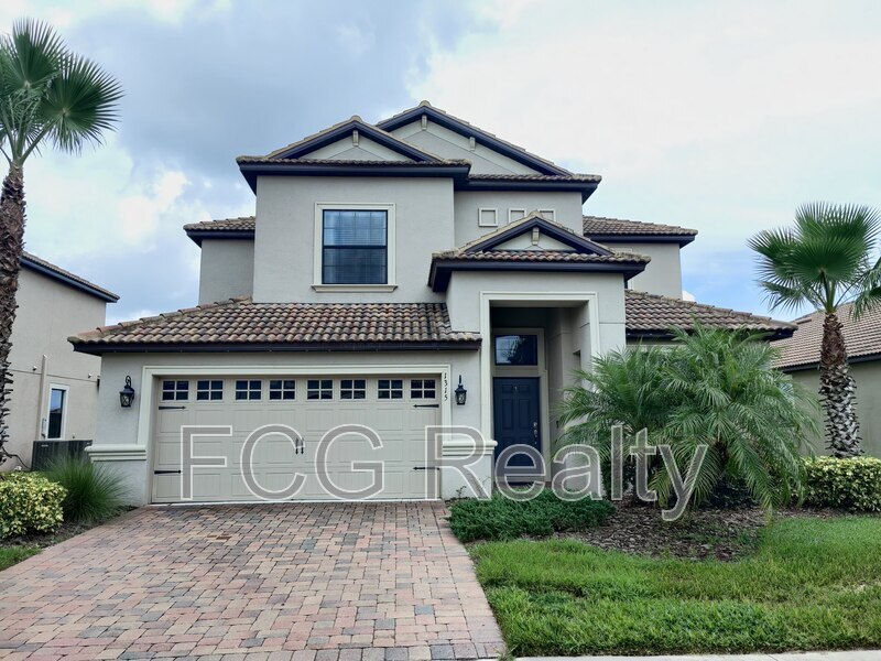 1315 Moss Creek Ln in Champions Gate, FL - Foto de edificio