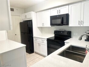 8940 Colonnades Ct E in Bonita Springs, FL - Building Photo - Building Photo