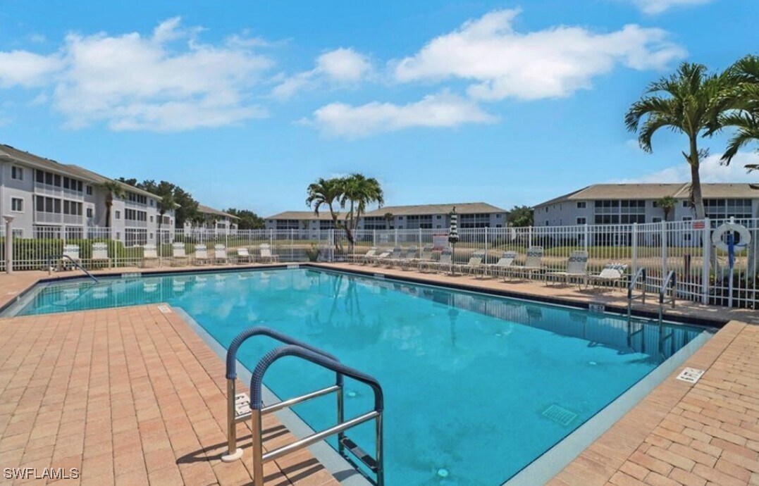 7818 Great Heron Way in Naples, FL - Building Photo