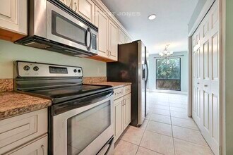 1220 Commonwealth Cir-Unit -# M-204 in Naples, FL - Building Photo - Building Photo