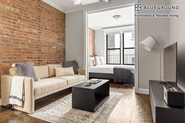 property at 209 E 25th St