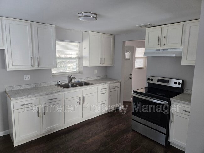 property at 6131 George Wood Ln W