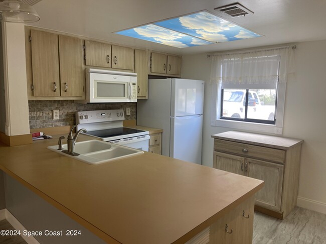 1800 University Ln-Unit -102 in Cocoa, FL - Building Photo - Building Photo