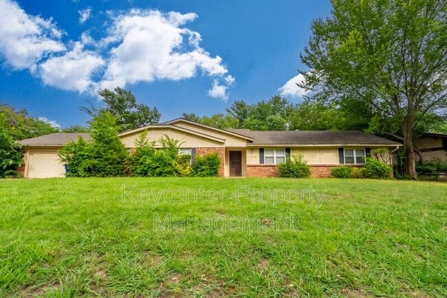property at 6717 S Louisville Ave