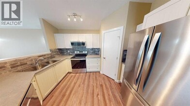 7418 A-7114 114 St in Grande Prairie, AB - Building Photo - Building Photo