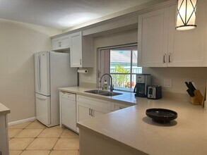 1127 E Seminole Ave, Unit 8A in Jupiter, FL - Building Photo - Building Photo