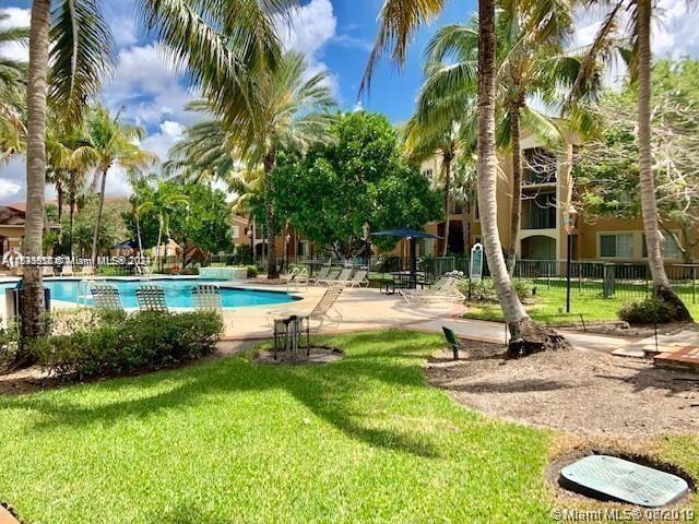 7910 N Nob Hill Rd, Unit 306 in Tamarac, FL - Building Photo