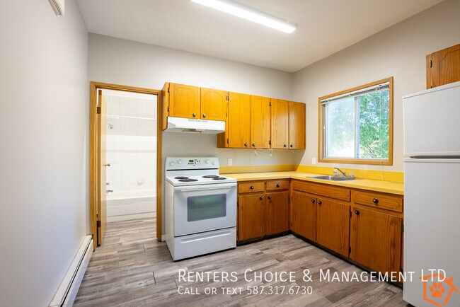 MAIN FLOOR UNIT With Assigned Parking and in Medicine Hat, AB - Building Photo - Building Photo