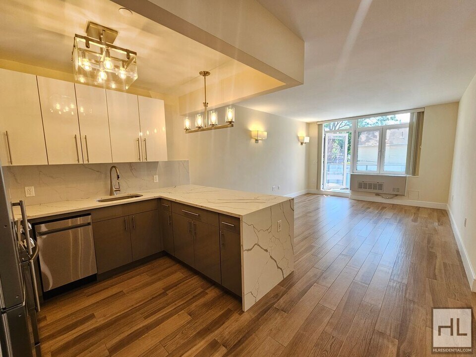 Modern 1-Bedroom with Balcony in Prime Nor in Queens, NY - Building Photo