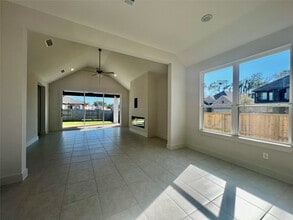 10602 Blossom River Dr in Sienna, TX - Building Photo - Building Photo