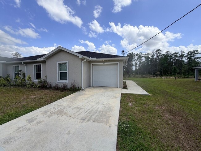 361-363 Greenbriar Blvd in Lehigh Acres, FL - Building Photo - Building Photo