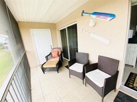 9700 Fiddlers Green Cir, Unit 219 in Rotonda West, FL - Building Photo - Building Photo