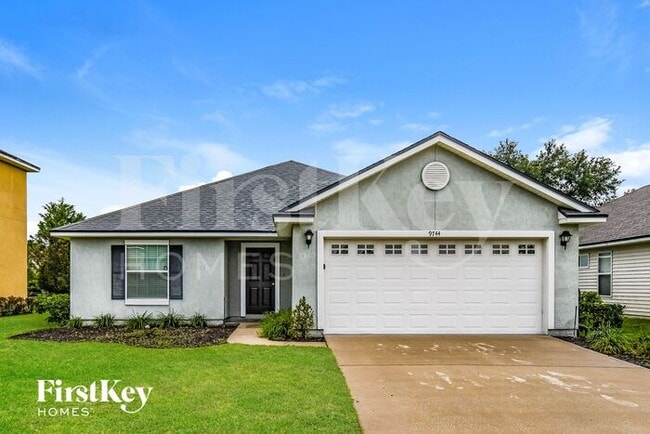 property at 9744 Woodstone Mill