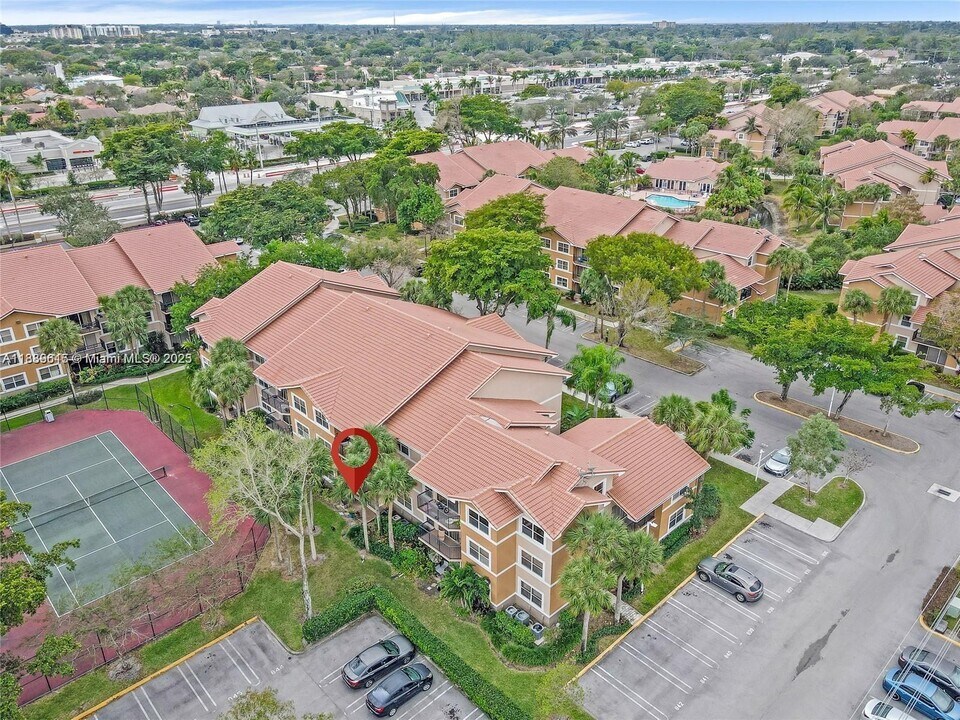 8801 Wiles Rd in Coral Springs, FL - Building Photo