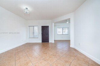 11115 W Okeechobee Rd in Hialeah Gardens, FL - Building Photo - Building Photo