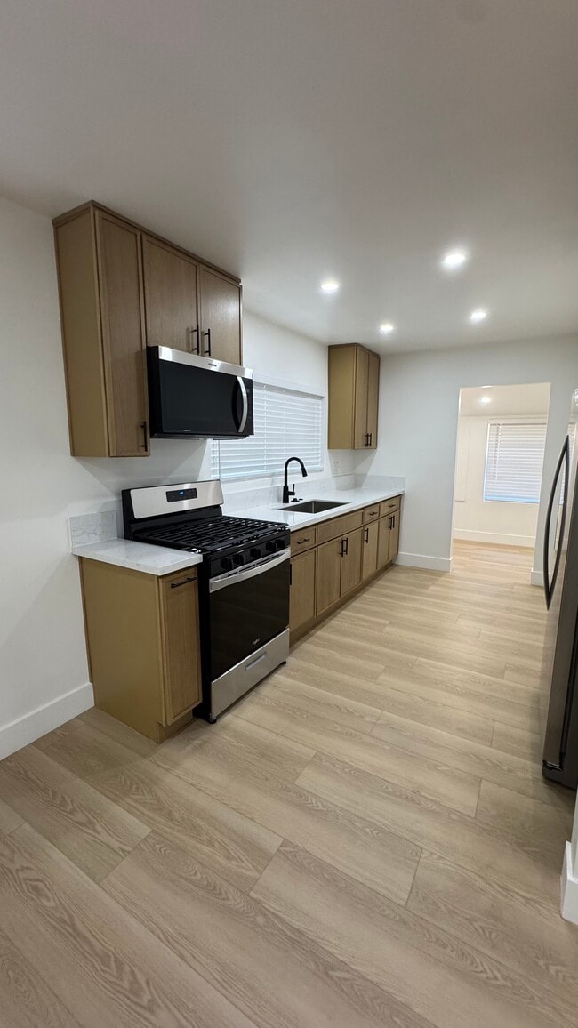 property at 3443 E 8th St