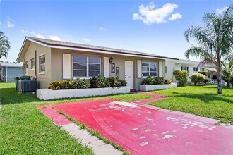 4938 NW 54th Ct in Tamarac, FL - Building Photo - Building Photo