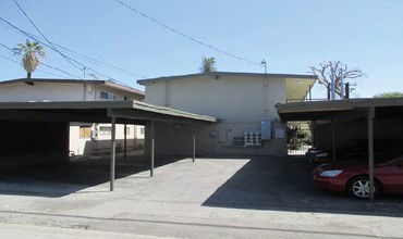 Moongate Apartments in Downey, CA - Building Photo - Building Photo