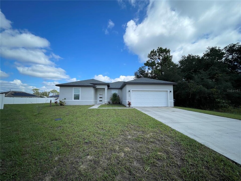 144 Zinnia Ln in Poinciana, FL - Building Photo