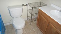 Tile floors in Bathroom - Palmetto Place Apartments in Orangeburg, South Carolina