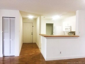 11229 W Atlantic Blvd-Unit -203 in Coral Springs, FL - Building Photo - Building Photo