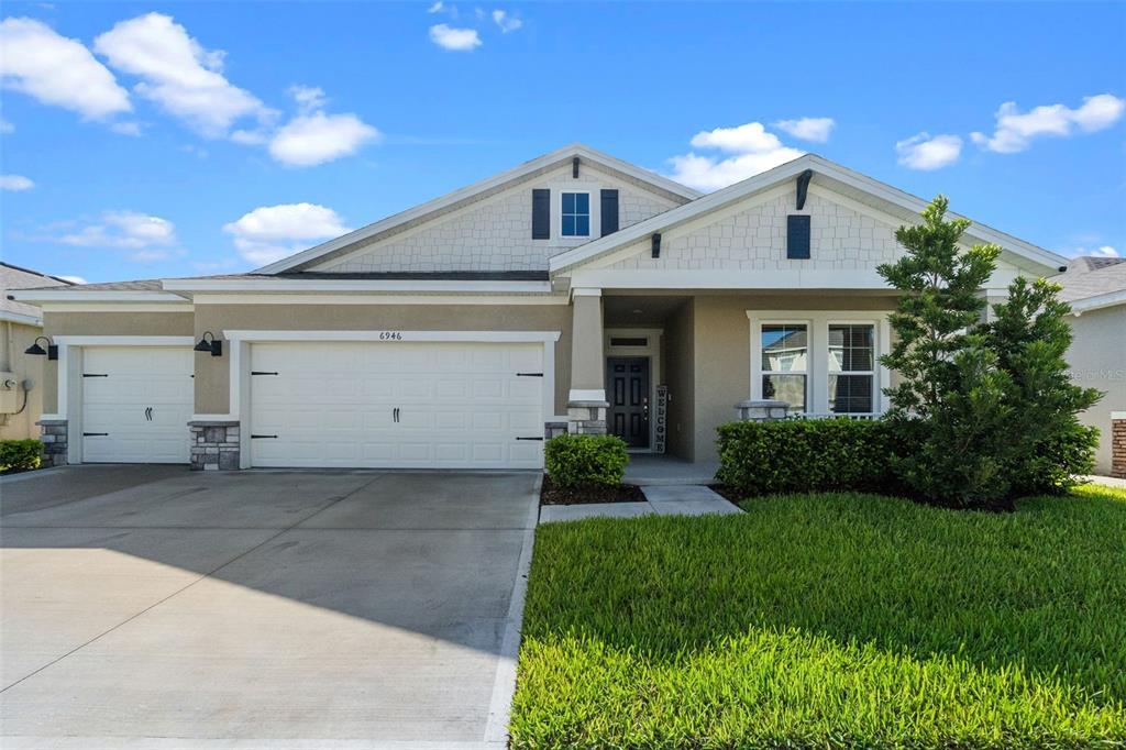 6946 Audobon Osprey Cv in Harmony, FL - Building Photo