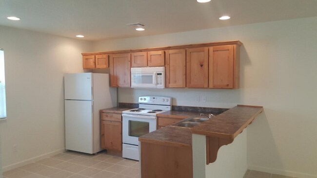 209 E Adams St-Unit -A in Pittsburg, KS - Building Photo - Building Photo