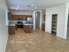 13616 W Gelding Dr in Surprise, AZ - Building Photo - Building Photo