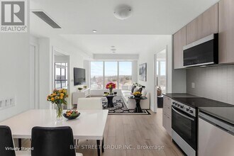 7439 Kingston Rd in Toronto, ON - Building Photo - Building Photo