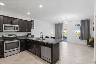 5313 Ashley River Rd in West Palm Beach, FL - Foto de edificio - Building Photo