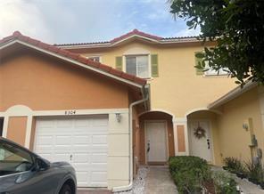 8304 Santa Monica Ave in Tamarac, FL - Building Photo