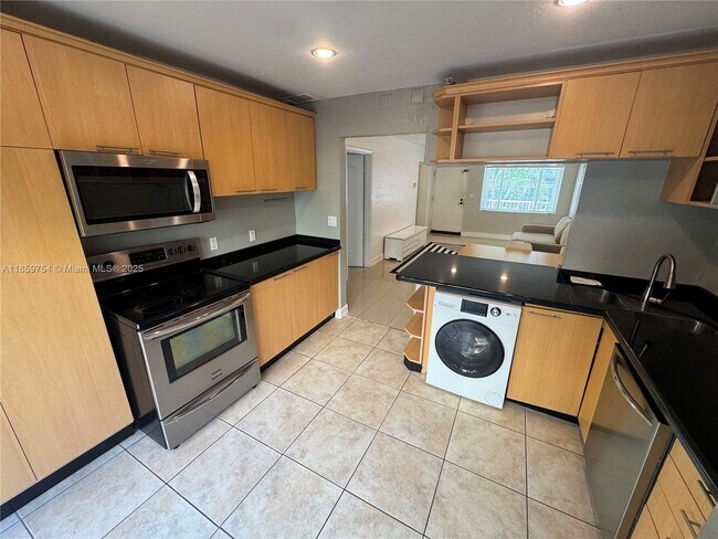 property at 677 NE 24th St