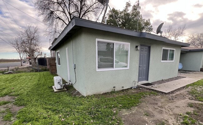 property at 803 S Farmersville Blvd