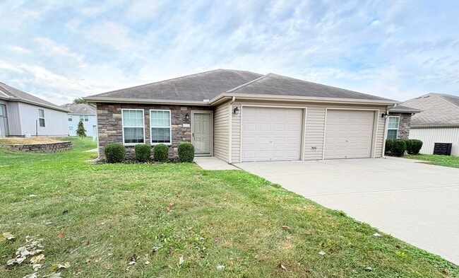 property at 102 SW Rock Garden St