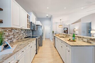 1240 Ambra Dr in Melbourne, FL - Building Photo - Building Photo