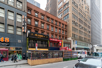58-62 W 48th St in New York, NY - Foto de edificio - Building Photo