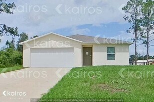 1128 Hayes Ave S in Lehigh Acres, FL - Building Photo