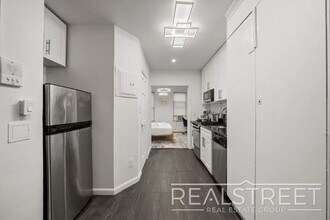 Modern 2BR/1BA in Prime Lower Manhattan | Fast Access to Midtown & Google HQ in New York, NY - Building Photo - Building Photo