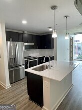 1080 W Peachtree St NW, Unit 1307 in Atlanta, GA - Building Photo - Building Photo