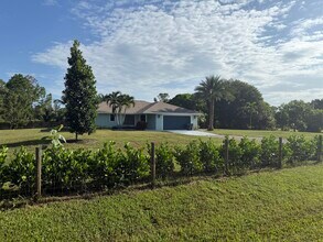 14073 76th Rd N in The Acreage, FL - Building Photo - Building Photo