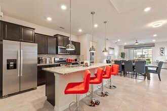 7195 Oakmoss Loop in Davenport, FL - Building Photo - Building Photo