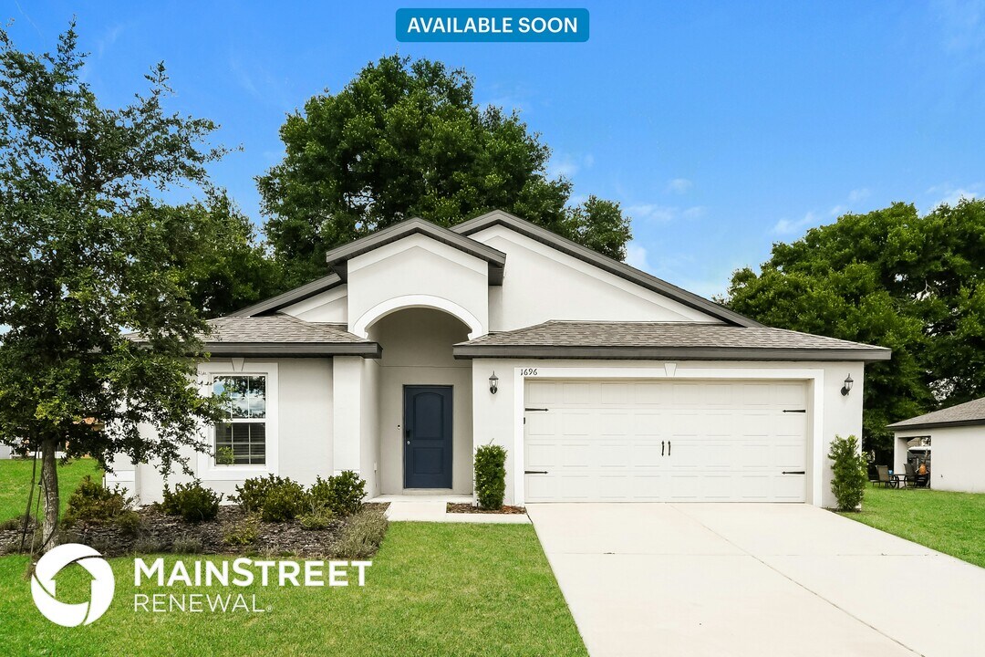 1696 Gopher Tree St in Mascotte, FL - Building Photo