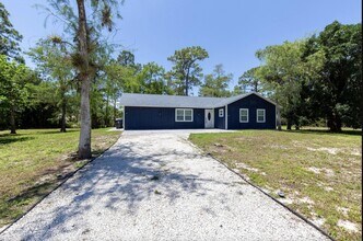 16932 Aintree Dr W in The Acreage, FL - Building Photo - Building Photo