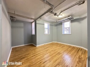 1360 W Estes Ave, Unit M04B in Chicago, IL - Building Photo - Building Photo