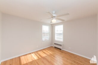 7534 N Bell Ave, Unit 2H in Chicago, IL - Foto de edificio - Building Photo