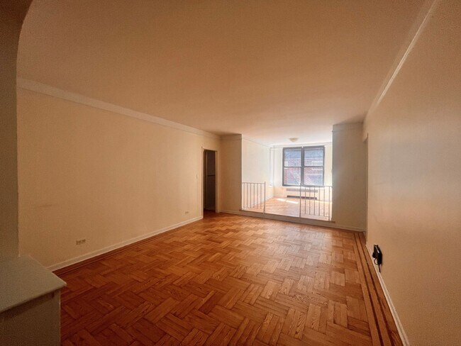 property at 124 E 24th St