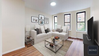229-231-231 E 12th St in New York, NY - Building Photo